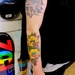 Skateboarder 2's Tattooed arm by allsop
