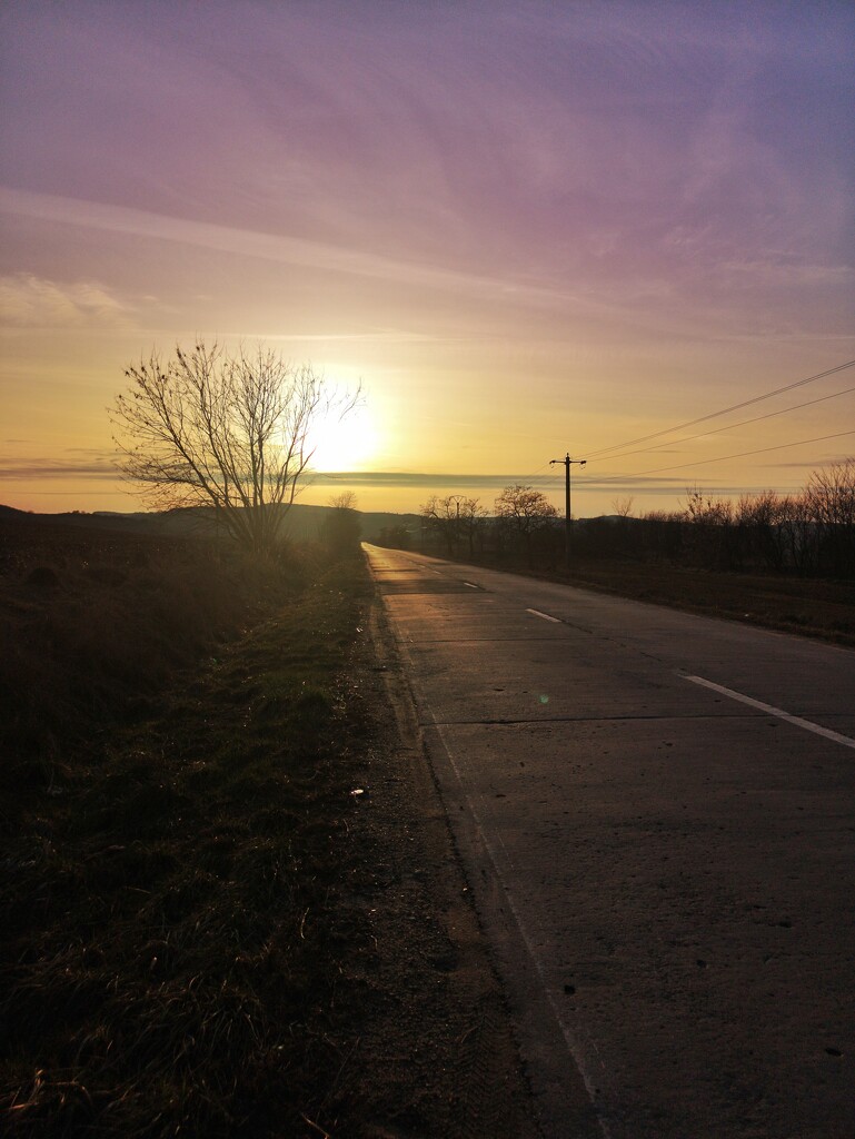 Sunset at the end of the road by ctst
