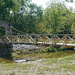 Bridge over still water by larrysphotos