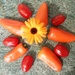 Mini peppers and a Calendula  by grace55