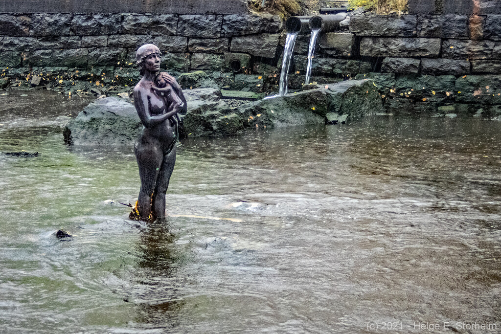 Bronze statue in the river by helstor365
