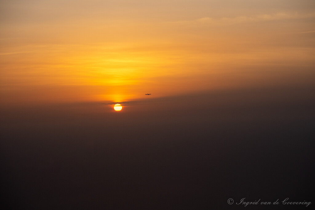 Sunrise from the plane with a plane by ingrid01