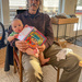 Grandpa and grandson reading together by jbritt