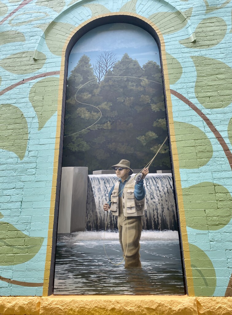 Mural of a Fly Fisherman by calm