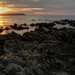 Sundown over Mana Island by helenw2
