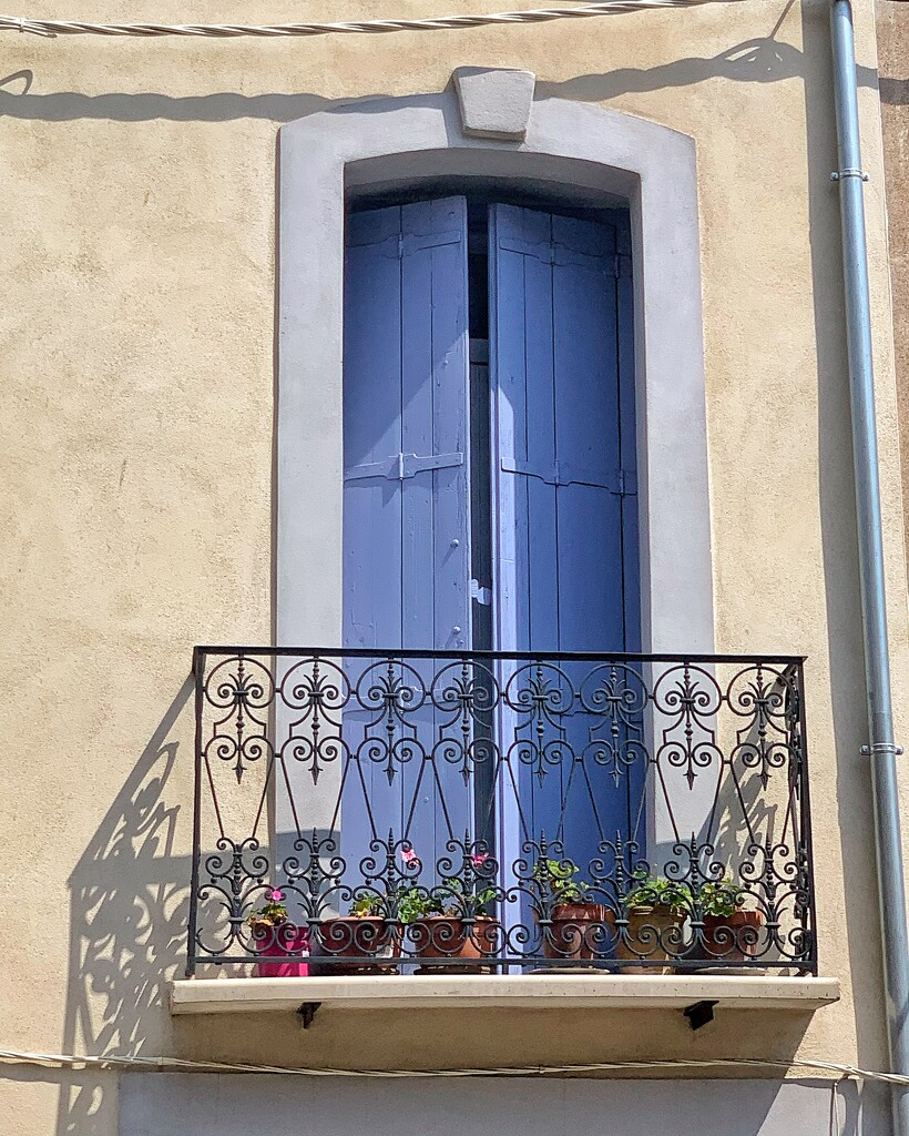 Wrought iron hearts on the balcony.  by cocobella