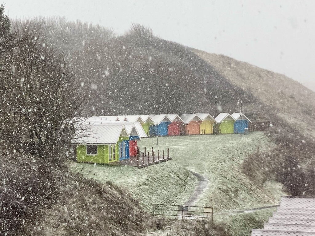 Beach huts in the snow by casablanca