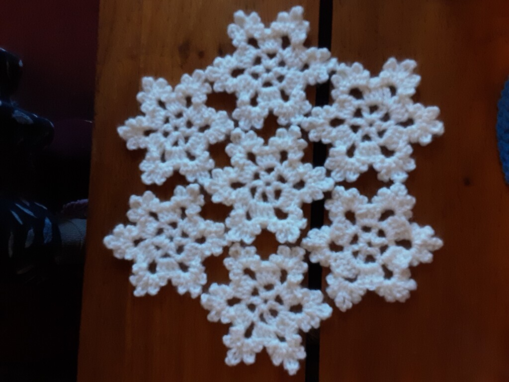Handmade crocheted snowflakes, by grace55