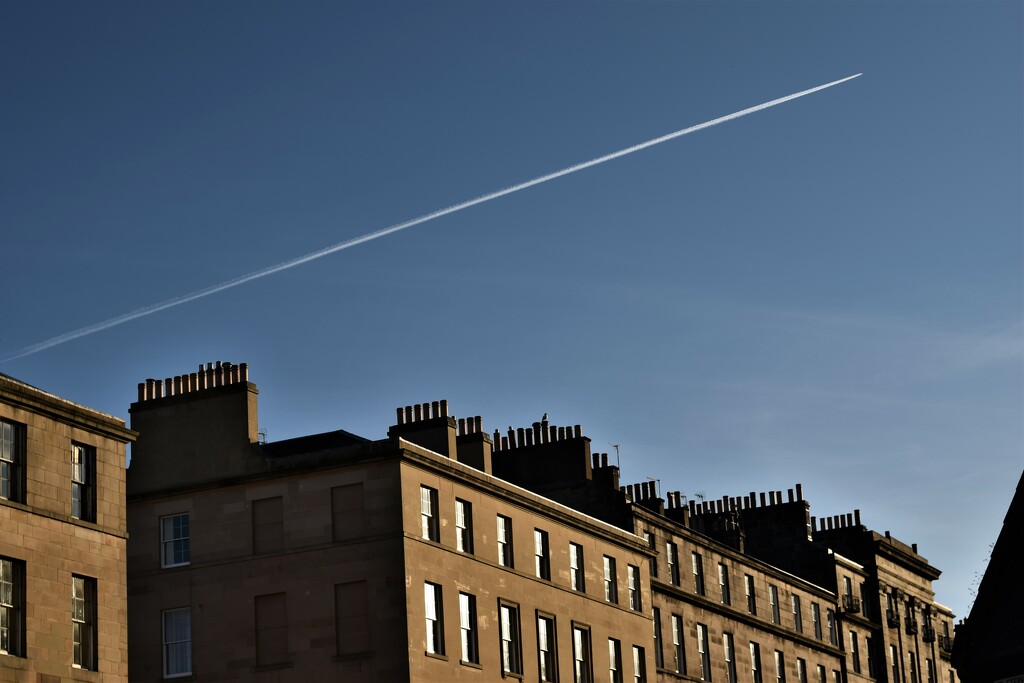 chimneys and contrail by christophercox