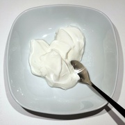 29th Dec 2021 - Yogurt in a white bowl on a white background