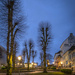 Linden trees, street lamps and a zig-zag road by helstor365