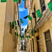 A street with flags.  by cocobella