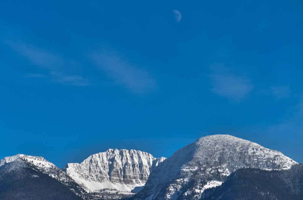 Moon Over The Mission Mountains by bjywamer