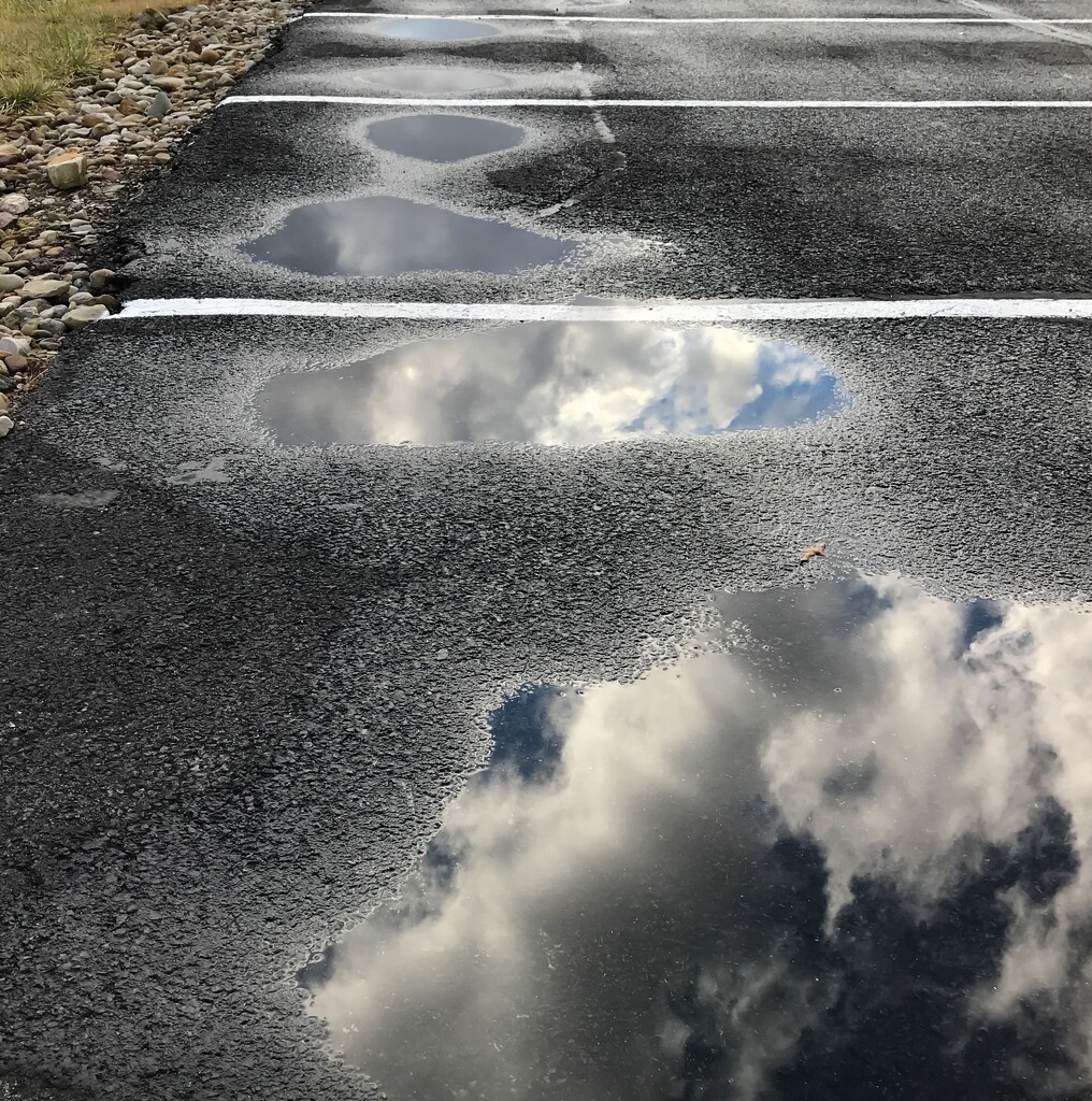 Reflections in the parking lot by mittens