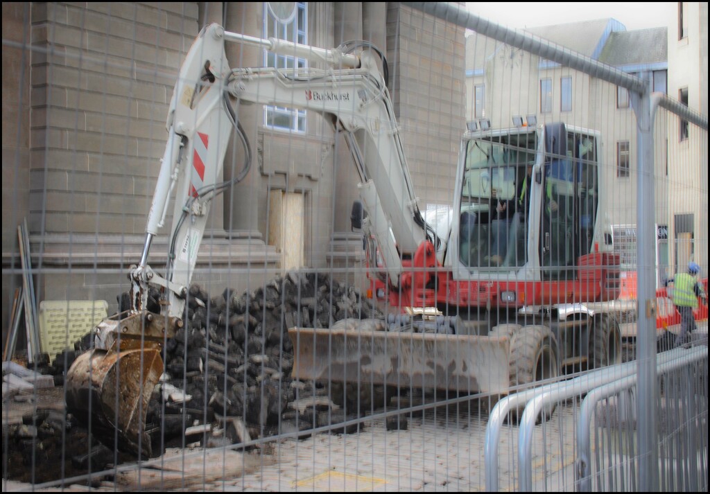 Digger Tearing up the Cobbles by sanderling