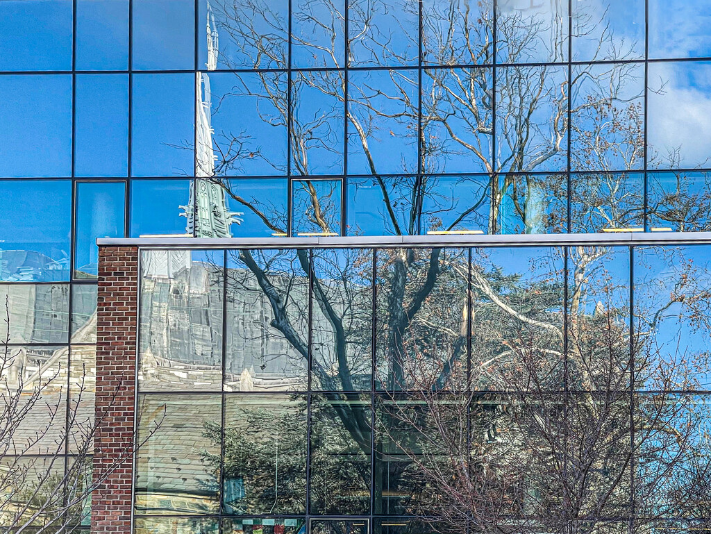 Distorted Reflections of church and trees by jbritt