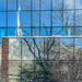 Distorted Reflections of church and trees by jbritt
