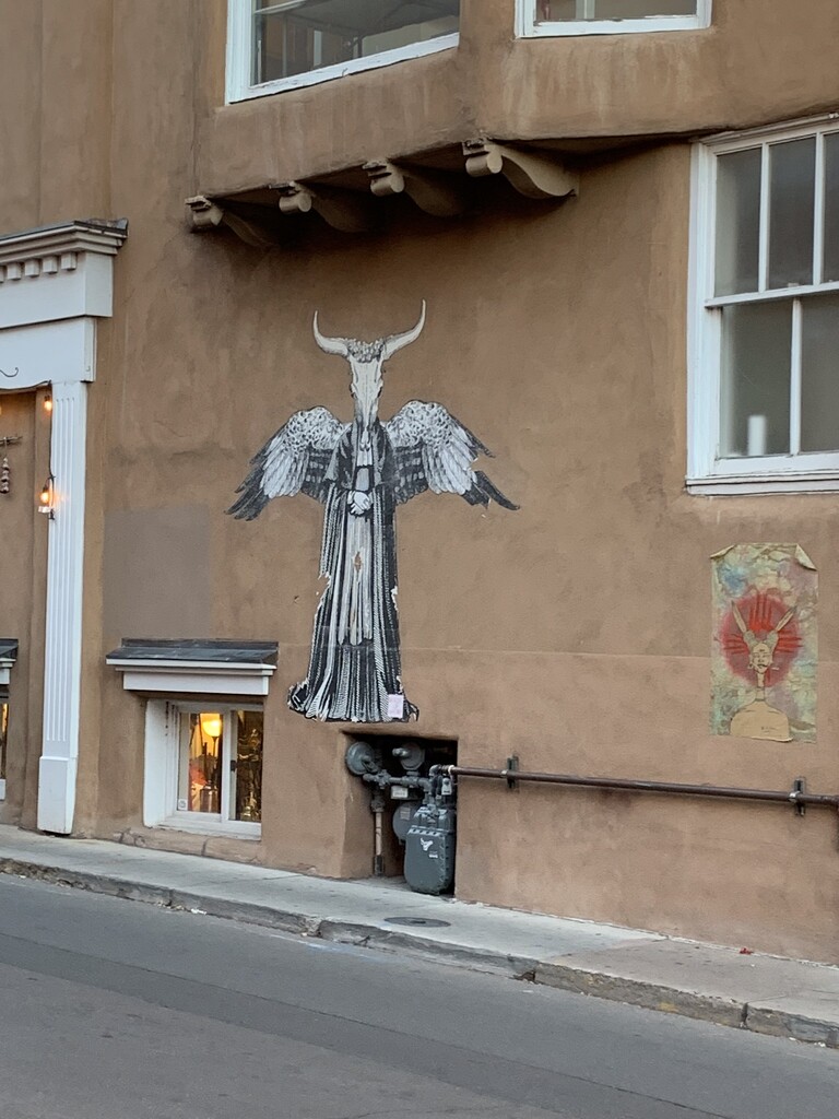 The “angel” on Don Gaspar Ave. in Santa Fe, New Mexico  by louannwarren