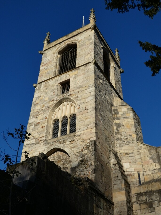 Tower of St Olave's Church by fishers