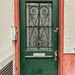 Green door with three hearts.  by cocobella