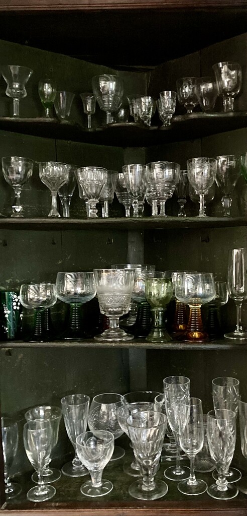 Glasses in the corner cupboard by sianharrison