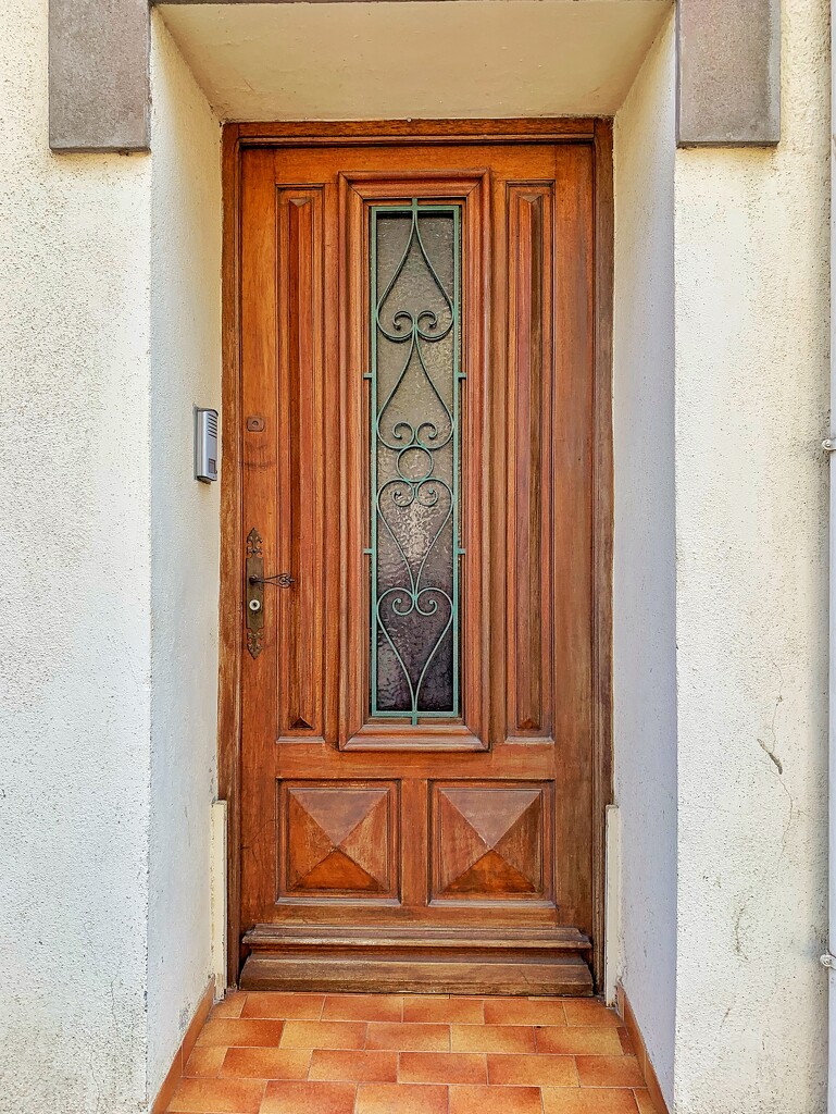 Four hearts on a brown door.  by cocobella