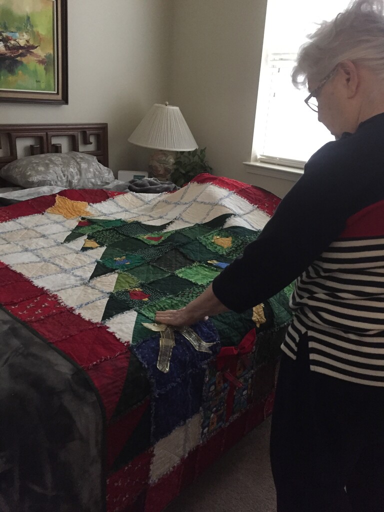 Showing me one of her Christmas quilts by margonaut