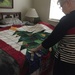Showing me one of her Christmas quilts by margonaut