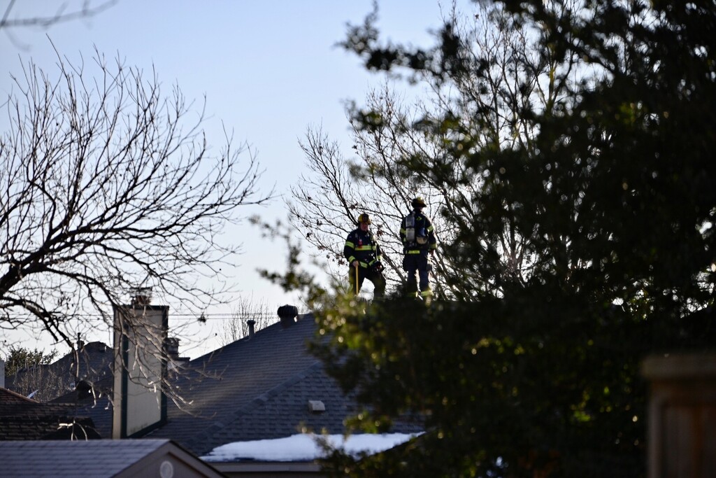 Firemen on the Neighbour’s Roof by metzpah