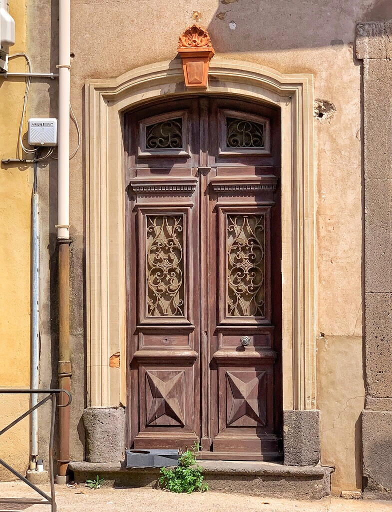 Four hearts on a brown doors.  by cocobella
