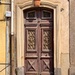Four hearts on a brown doors.  by cocobella