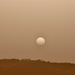 Rare moment of sun with fog in sepia color by antonios