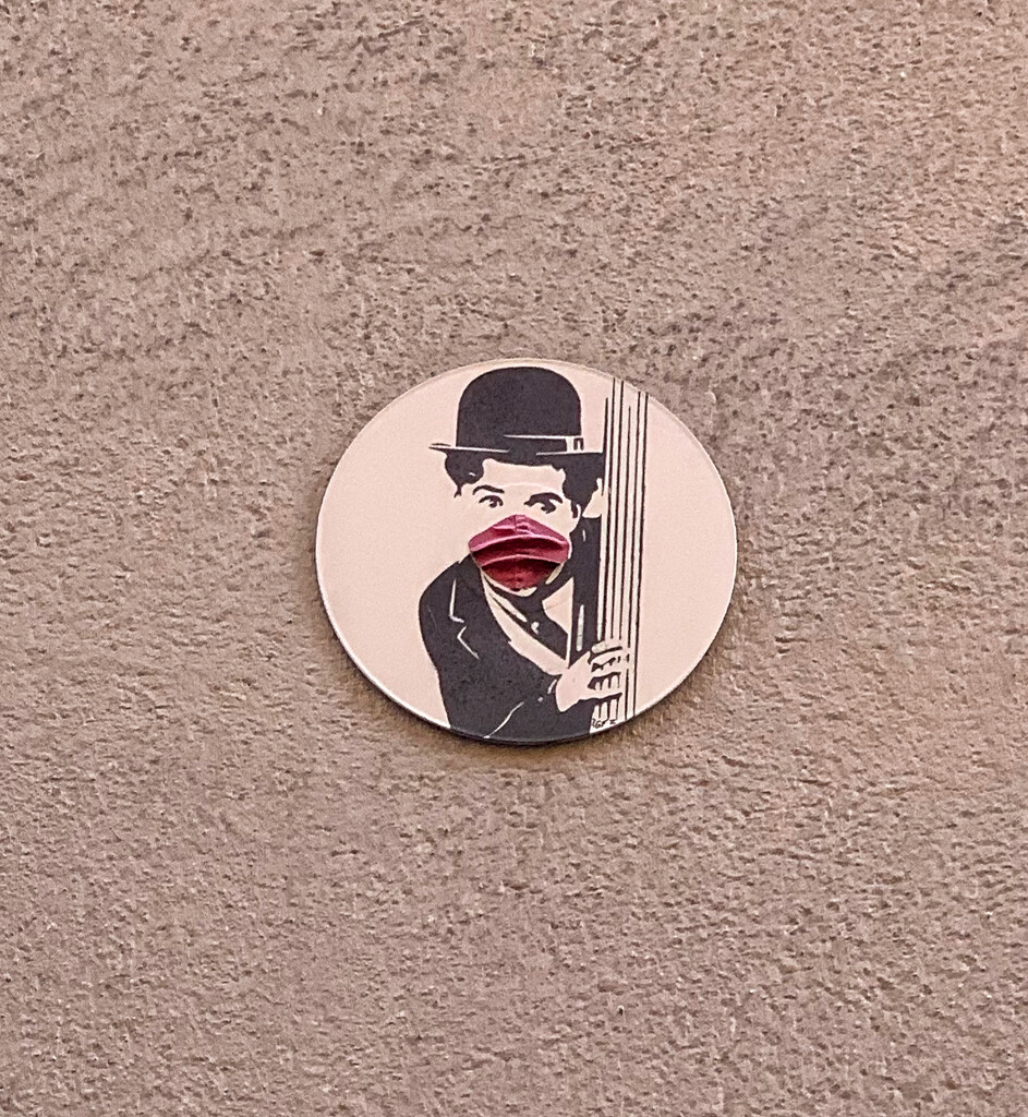 Charlie Chaplin with a mask.  by cocobella