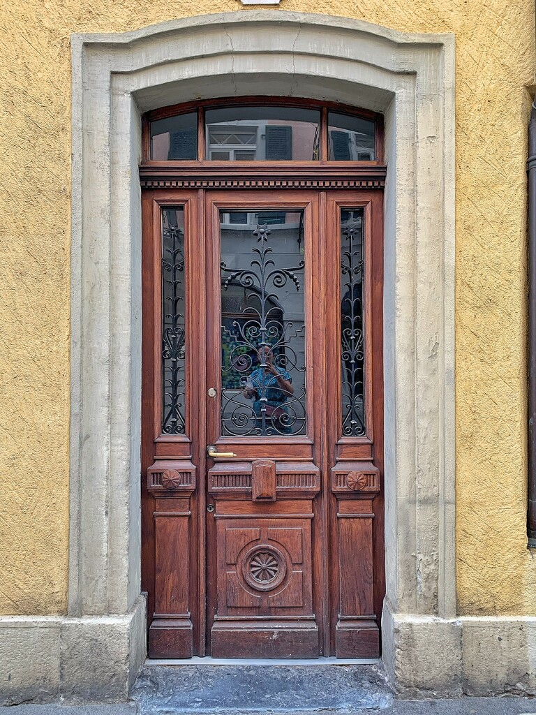 Five hearts on a brown door.  by cocobella