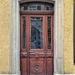 Five hearts on a brown door.  by cocobella