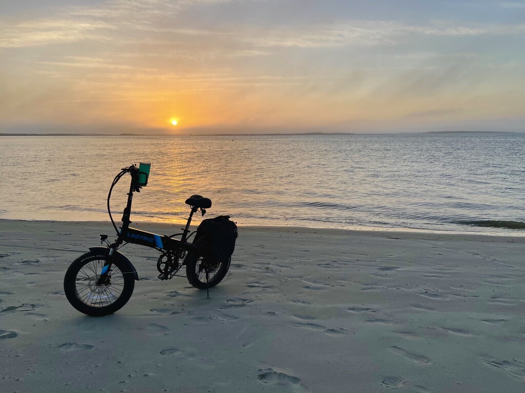 Bike on the beach.  by clayt