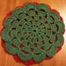 A crocheted coaster. by grace55