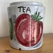 Red fruit on tea caddy by maggiej