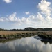 Afternoon marsh sky and tidal creek by congaree