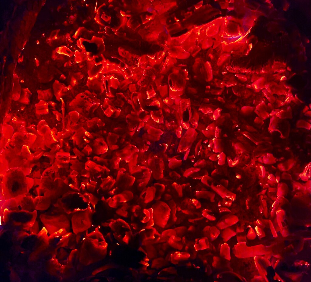 Red hot Coals in our outdoor fire pit by frantackaberry