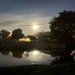 Moonset over the canal in Florida.
