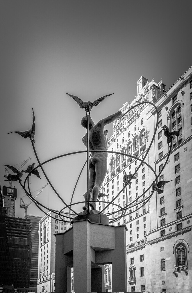 Monument to Multiculturalism and Royal York Hotel  by pdulis