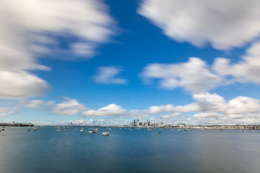 Fluffy clouds over Auckland by creative_shots