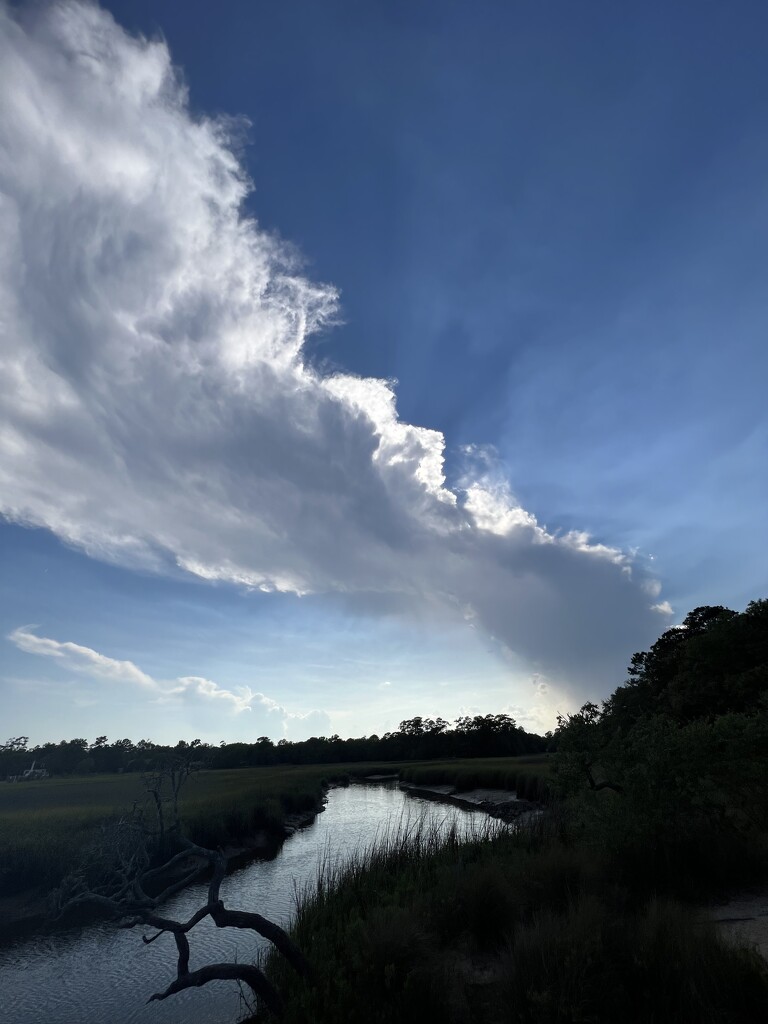 Unique cloud formation over the marsh by congaree