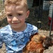 Kaden and his favorite Silkie rooster by louannwarren