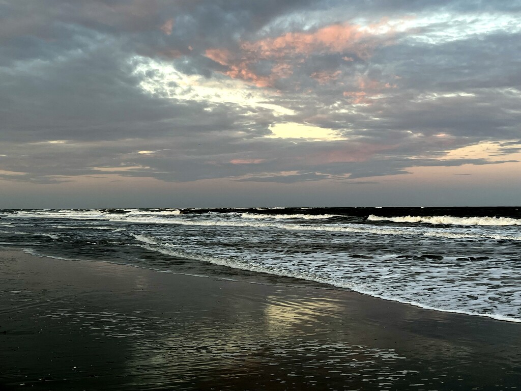Early evening skies over the Atlantic Ocean by congaree