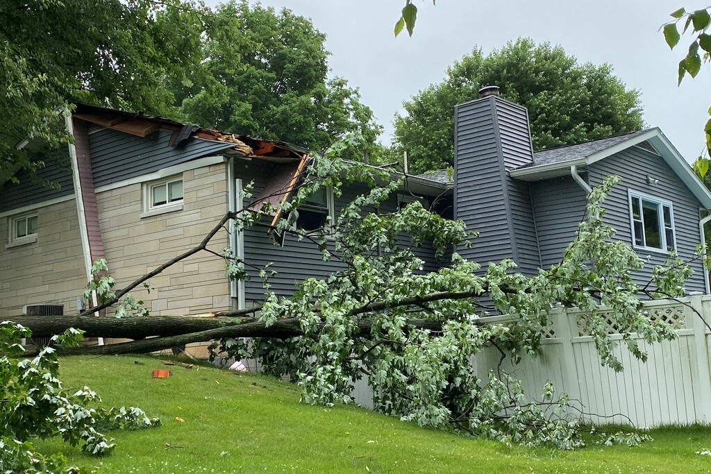 My neighbor's house after the storm by tunia