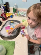 8th Jul 2022 - Lolo “helping” with dishes. 