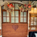 Wooden heart under the window.  by cocobella