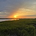 Sunset along the Ashley River at low tide by congaree